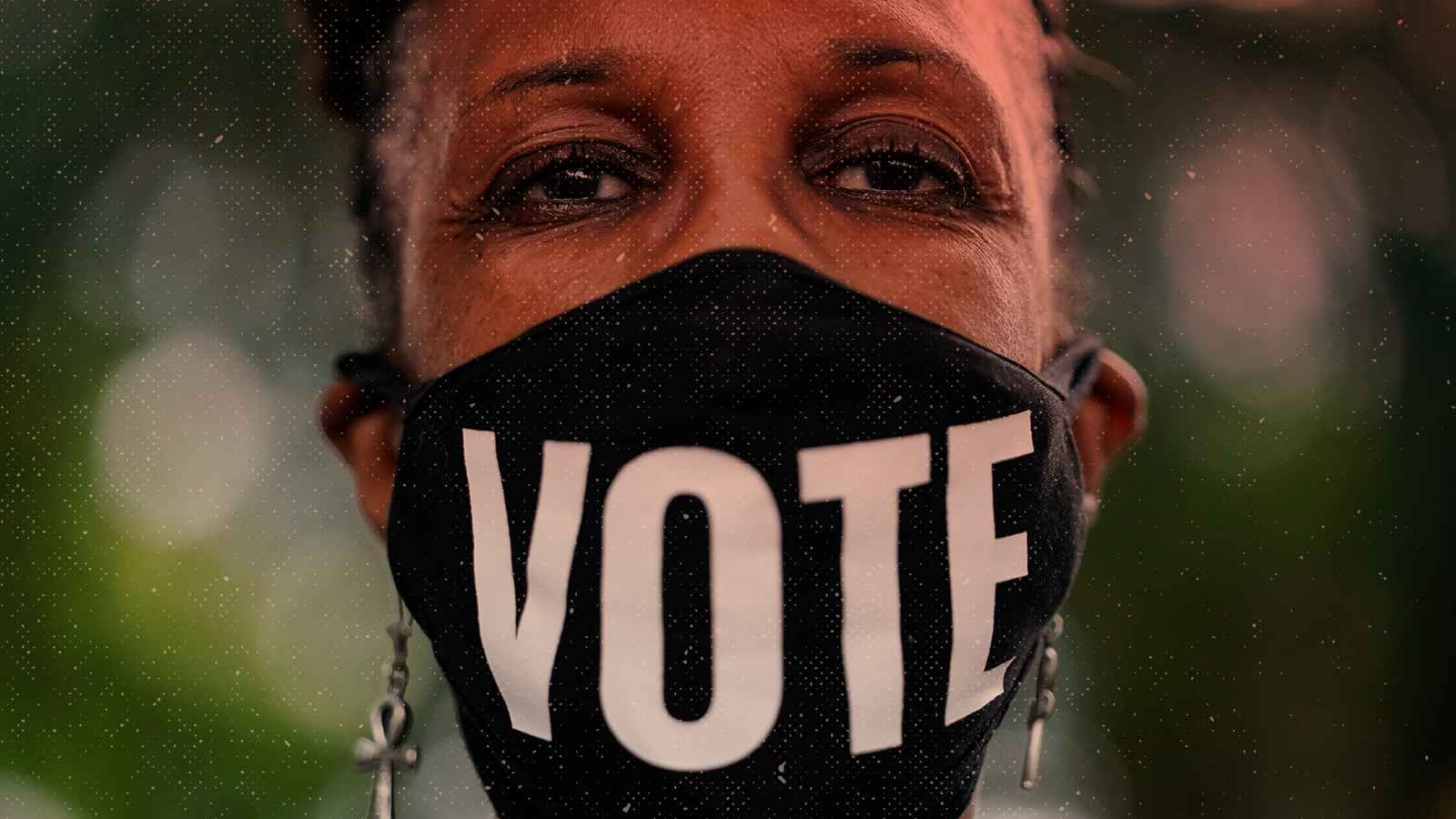 Demonstrator Jo-Lynn Gilliam, of Atlanta, wears a mask that says “vote” during a march for voting rights in 2021.