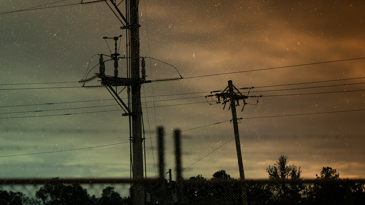 Power poles stand outside a power substation. (AP Photo/Gerald Herbert)