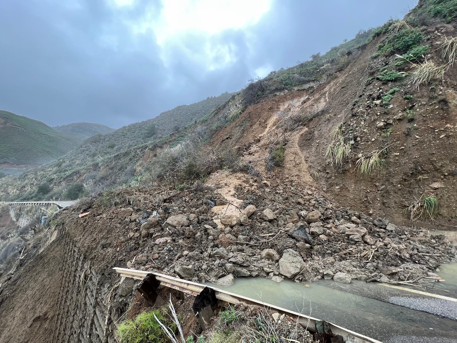 A landslide covering part of California’s Highway 1 in January 2023. (Credit: California Department of Transportation)